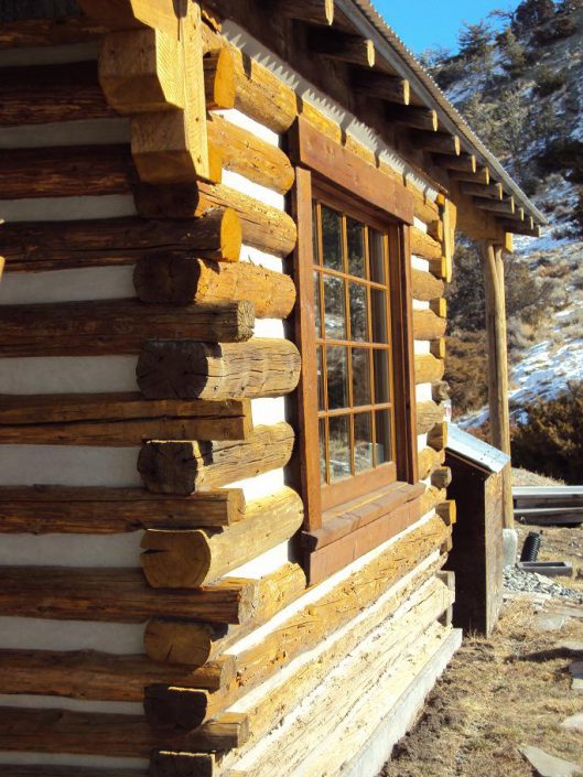 log cabin with reclaimed trim